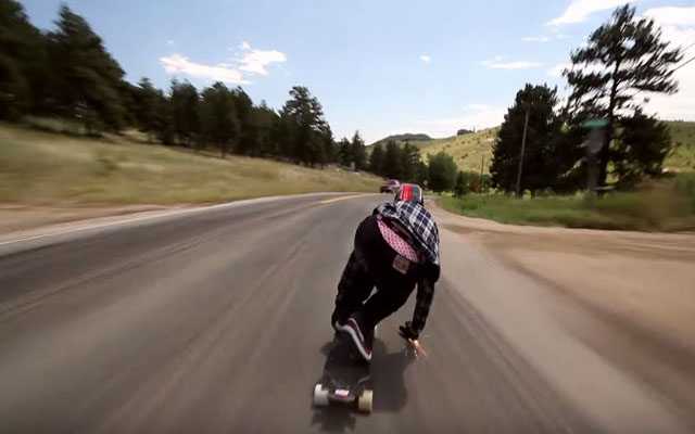 Dude Boards Down A Road At 70MPH (112KPH)–You Can Feel The Wind Whip Against Your Face!