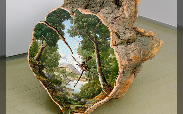 This Artist Paints Gorgeous Landscapes On Tree Logs To Spread Her Message