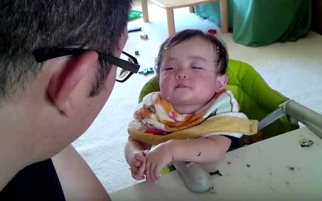 Baby Covered In Rice Tries Really Hard Not To Fall Asleep In Front Of Angry Dad