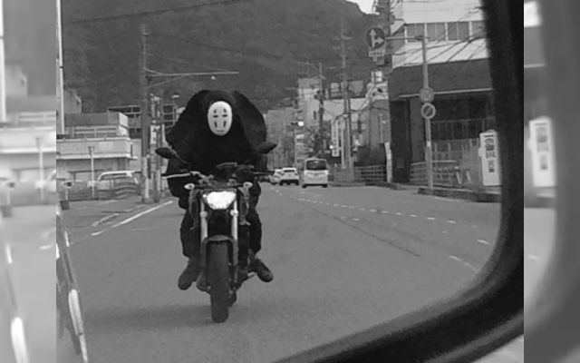 No Face Terrifies All While Speeding Down A Highway On A Motorcycle