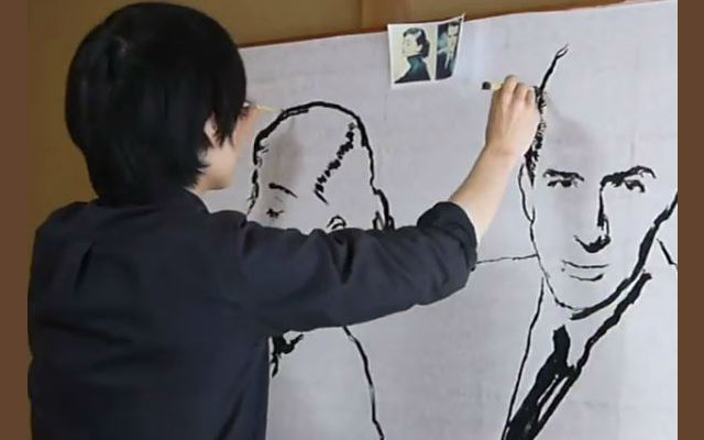 Japanese Artist Masterfully Paints Two Portraits Simultaneously, And Demonstrates Traditional Style Of Sumi-E