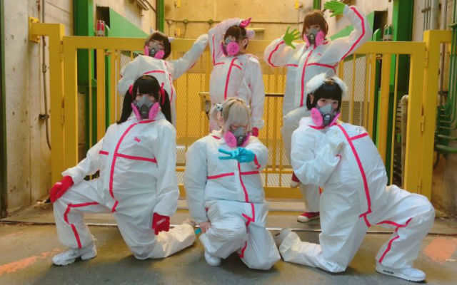 Japanese Idol Group Puts On Hazmat Suits To Hug Fans At Event