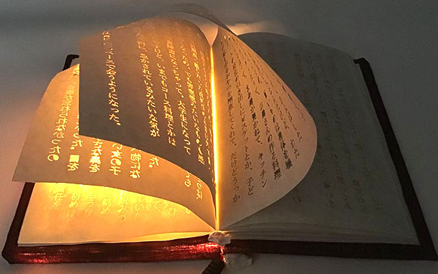 Seemingly Magical Glowing Book Looks Like It Came Right Out of An Anime