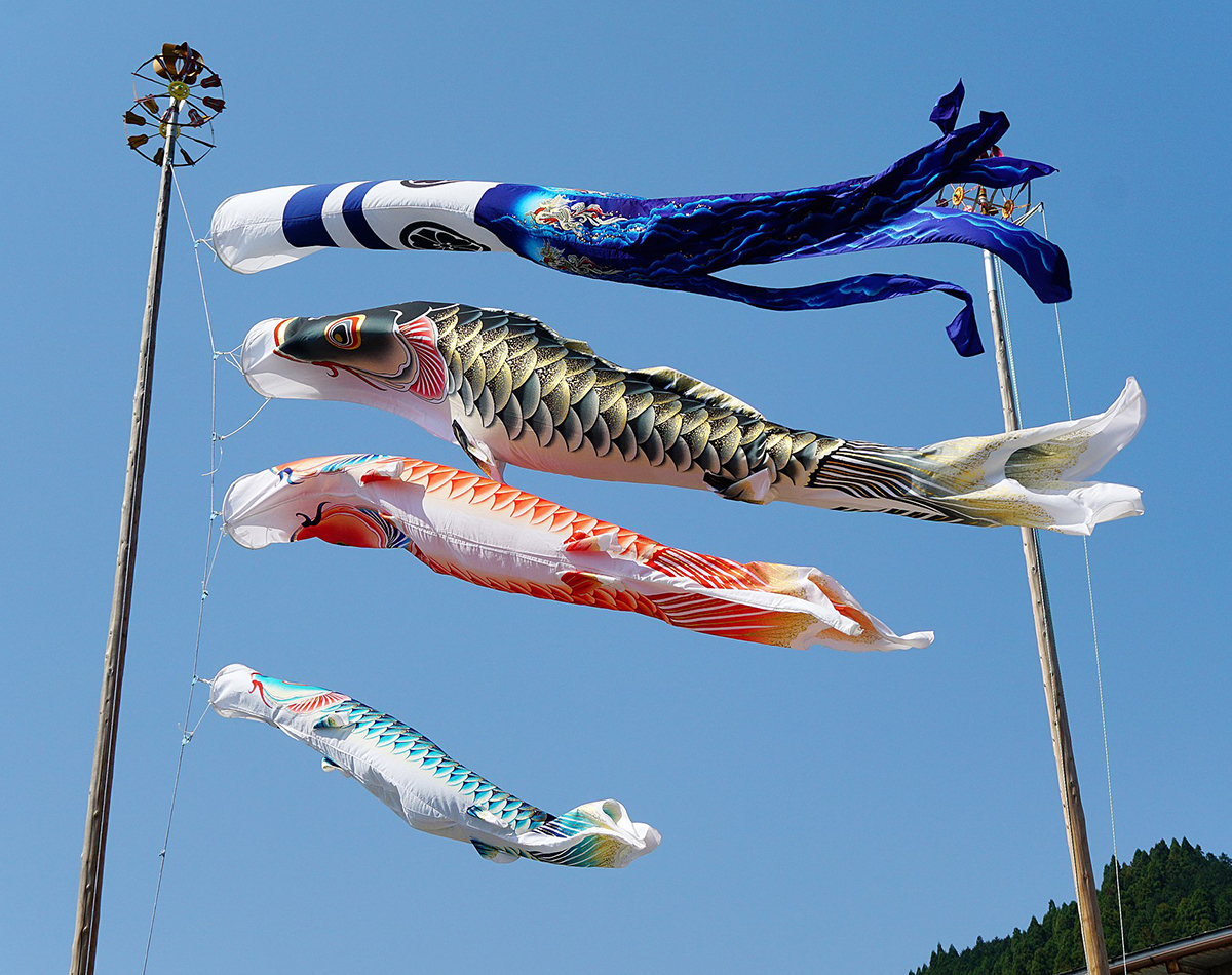 carp streamers on pole to celebrate children's day in japan