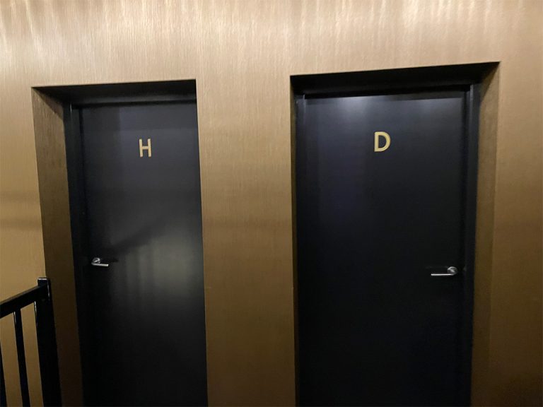 “D for Dandy?” Japanese man confused by sign on Dutch bathroom door