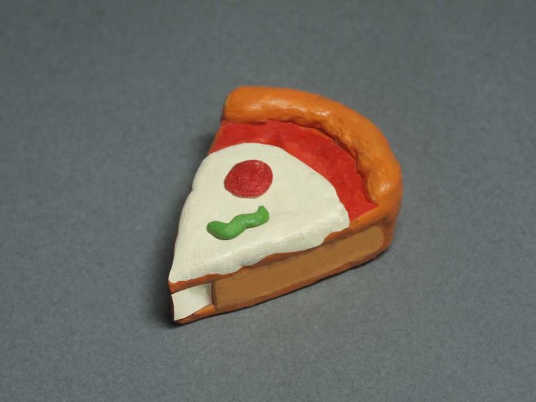 You can forgive this cute pizza correction tape dispenser for being cheesy