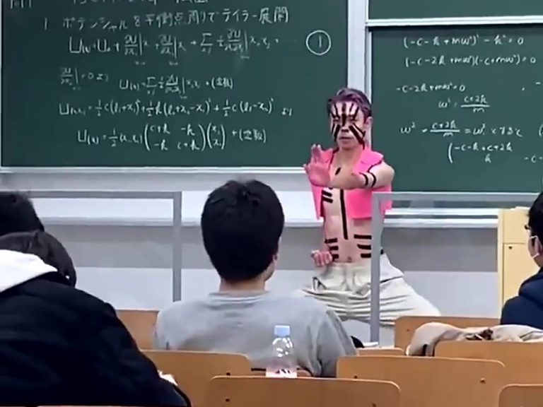 Japanese college student explains physics while cosplaying as demon Akaza from Demon Slayer