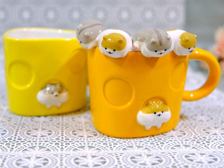 Adorable peeking hamster face and butt mugs make for a cheeky tea time