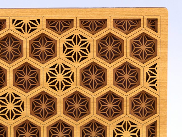 These gorgeous laser-cut wooden cover notebooks feature neo-Japanesque patterns