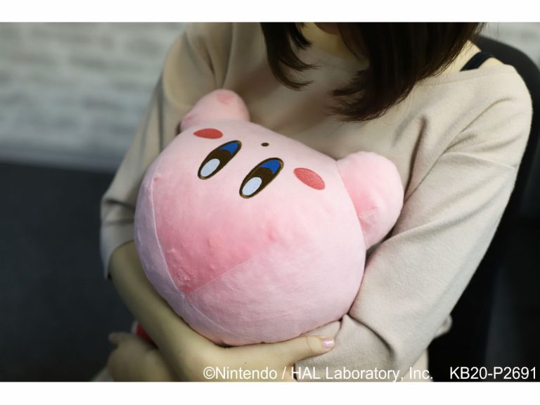Adorable heated Kirby plushie warms you when hugged and stares longingly at you