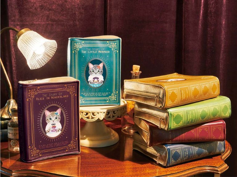 Carry your goods with clever pouches disguised as charming cat fairy tale tomes