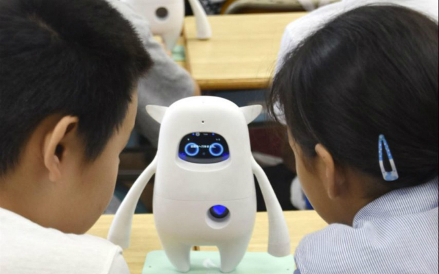 Japanese School Kids Learn English from AI Robots