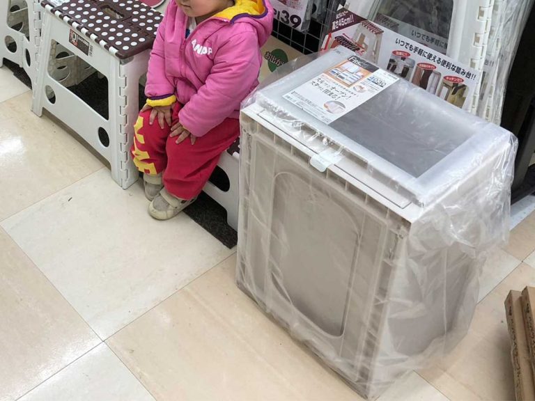 A girl taking a break while her parents are shopping. But they don’t get the hint…