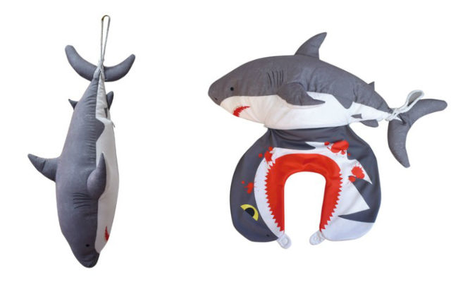 Have the comfiest bite taken out of your neck with this bloody shark pillow