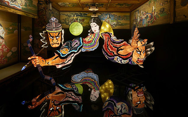 Traditional Nebuta Lanterns Suspended Over Water Look Like a Ghostly Apparition