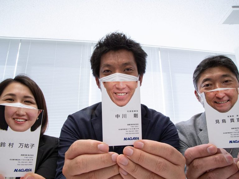 Japanese printing company’s witty business cards reveal the smile behind your mask