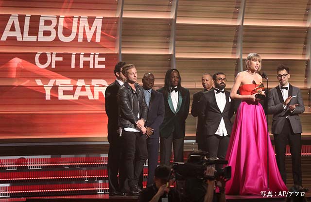 Taylor Swift, second from right, accepts the award for album of the year for “1989” at the 58th annual Grammy Awards on Monday, Feb. 15, 2016, in Los Angeles. (Photo by Matt Sayles/Invision/AP)