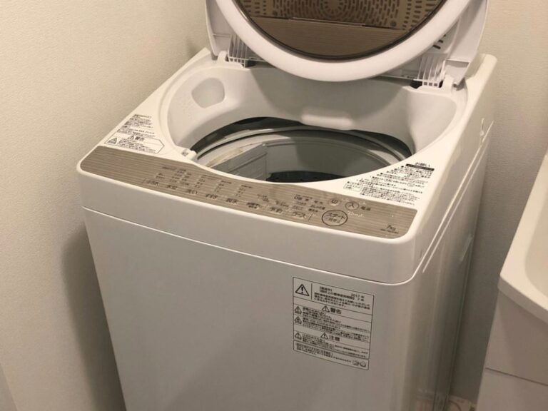 フタが開いた洗濯機