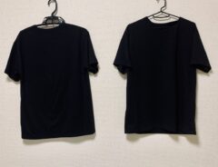 ハンガーにかけられた黒いTシャツ