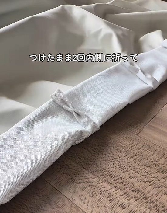上部を内側に２回折る