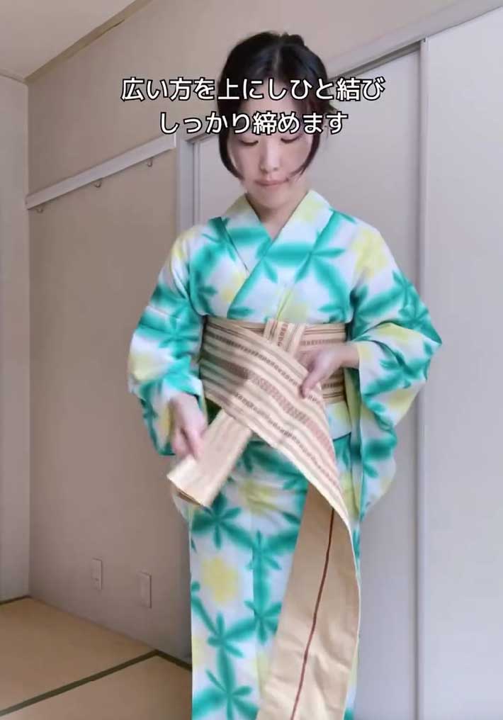 帯を結ぶ