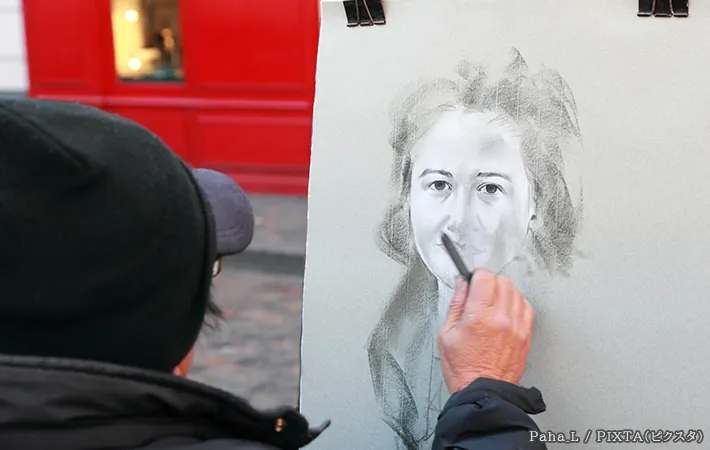 肖像画を描く人の写真