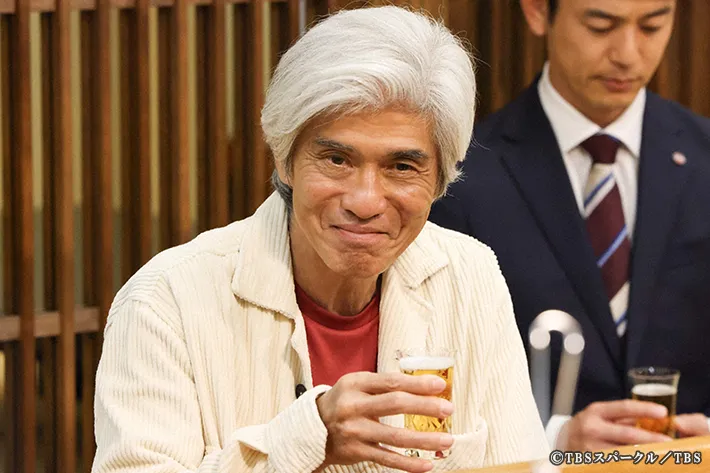 『ザ・ロイヤルファミリー』に出演する佐藤浩市さんが写る場面写真