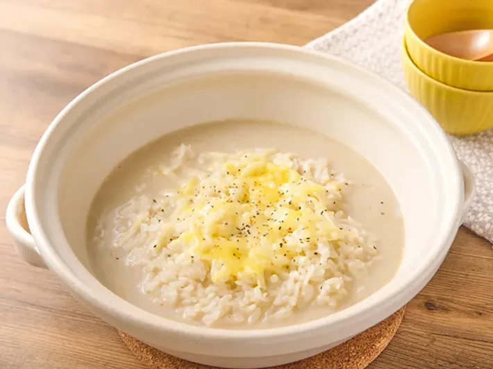 〆のチーズリゾットの写真