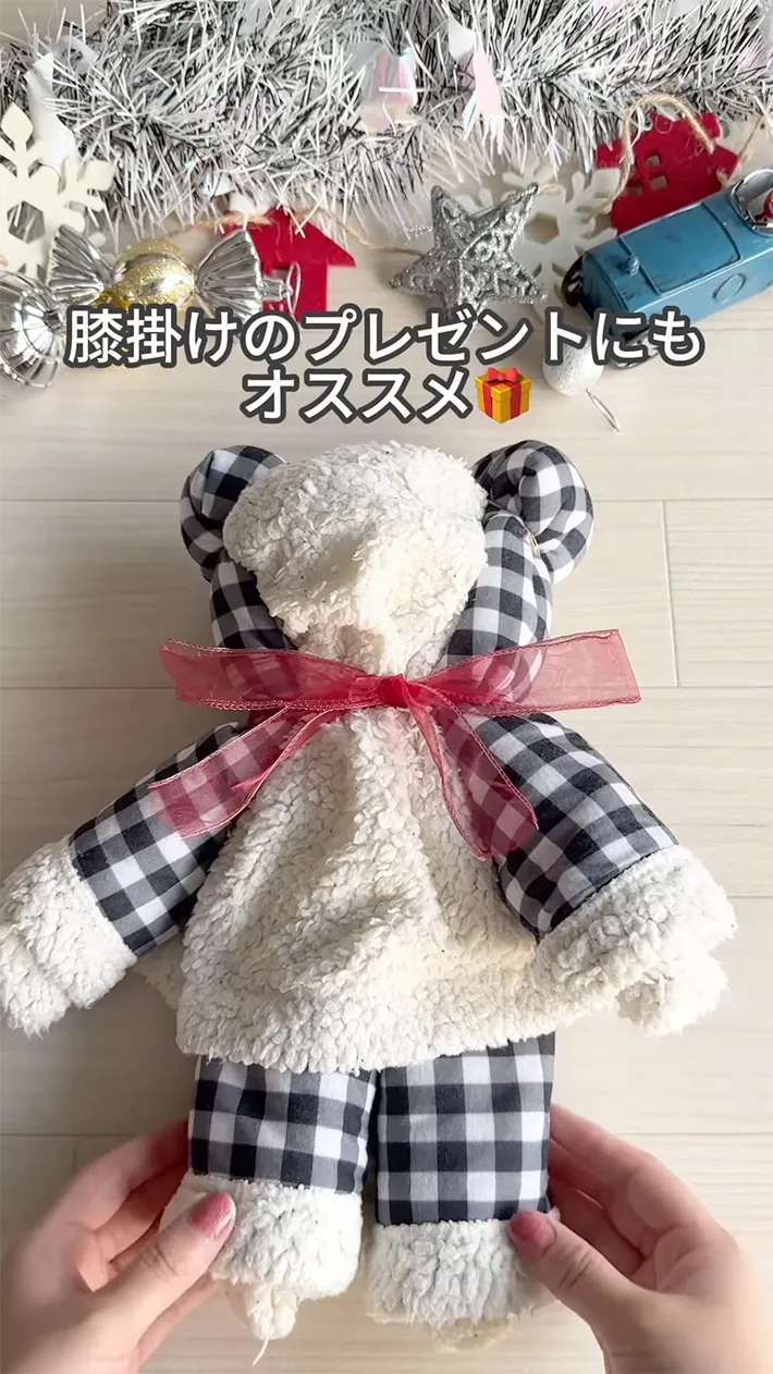 リボンを巻いたひざ掛けの写真