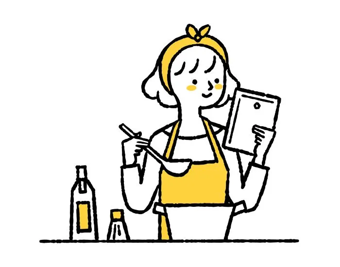 料理をしている女性