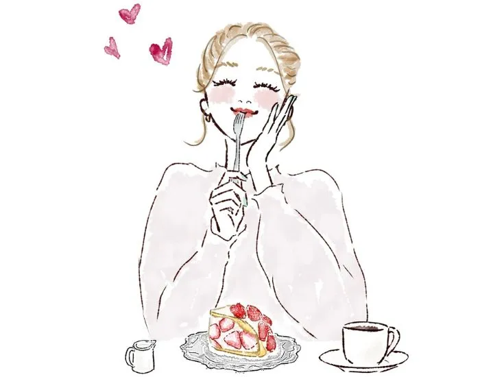 ケーキを食べる女性