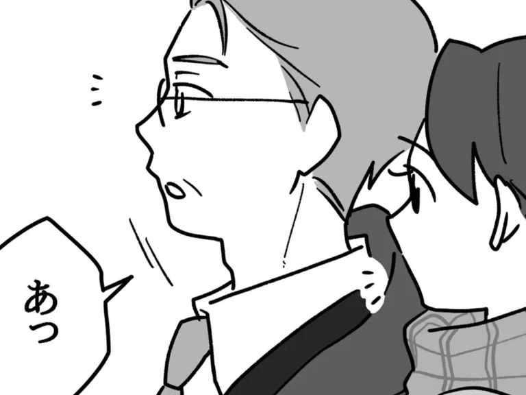 通勤途中のサラリーマンが描かれた漫画の写真