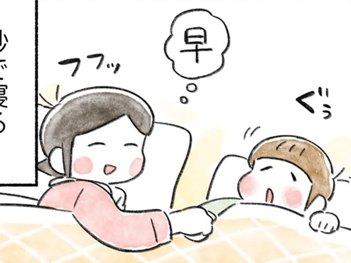 幼い娘と愛猫の寝姿が描かれた漫画の写真