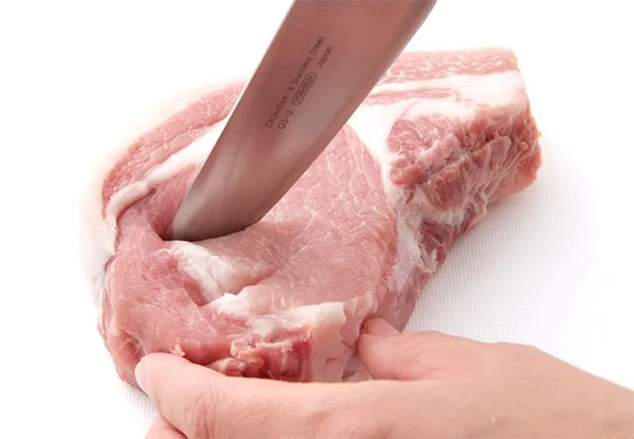 肉と包丁の写真