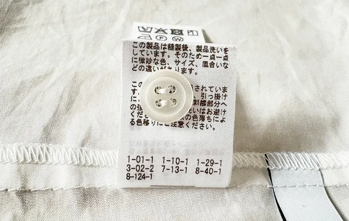 『タグにつけたボタン』の写真（撮影：Classy Life）