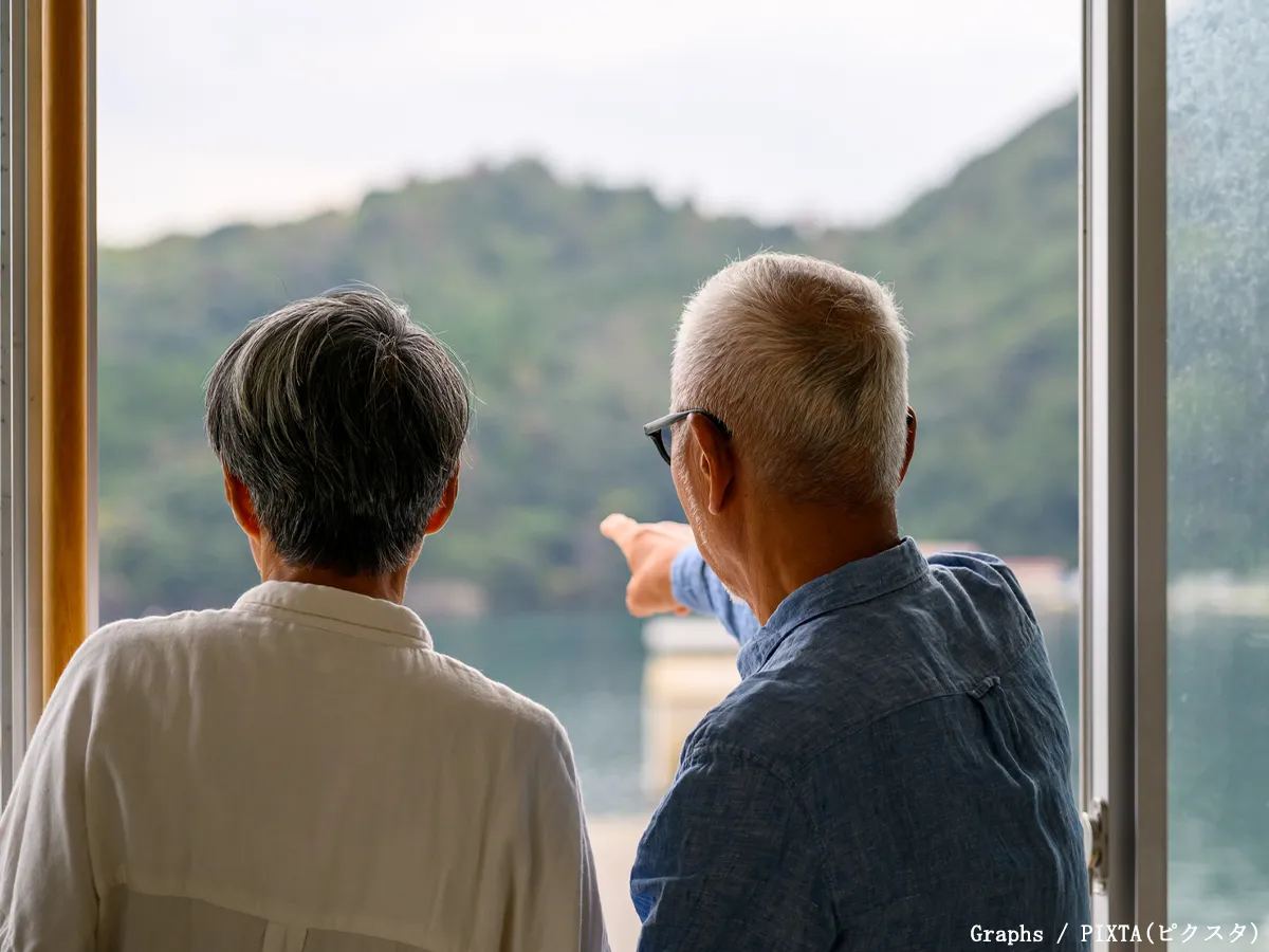 指を指す人の写真