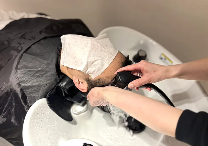 コンディショナーを流している写真