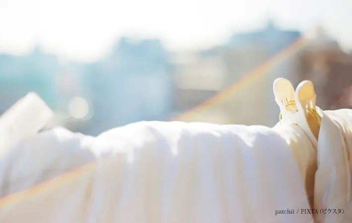 『晴れた日に布団を干す』写真