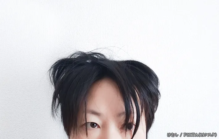 寝ぐせのついた人の写真