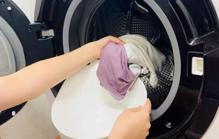洗濯機と服の写真