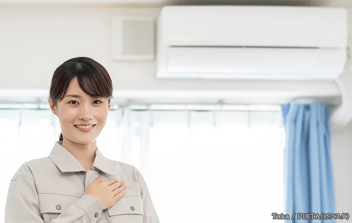 エアコンと女性の写真
