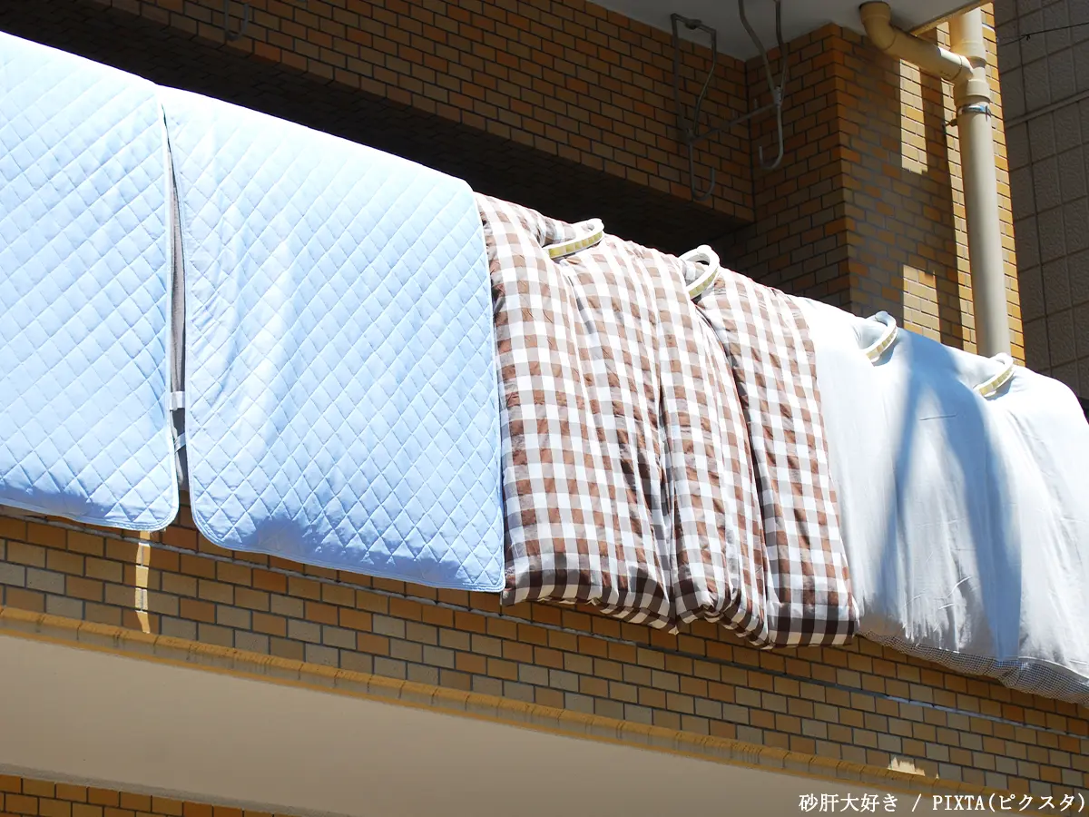 布団を干す写真